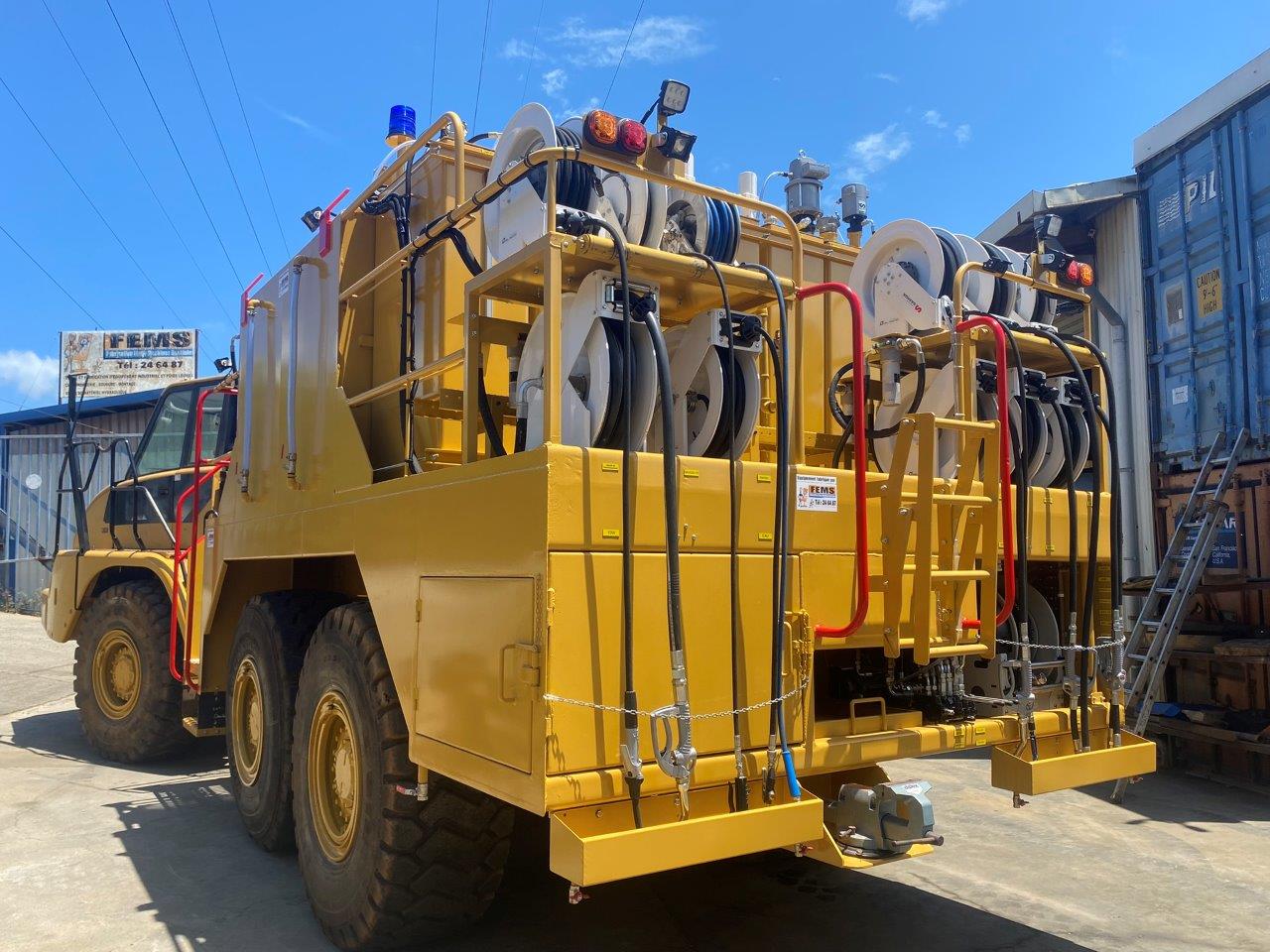 Mobile lubrication service truck equipped with multiple high-capacity Samoa automatic reels for fleet maintenance in mining and construction